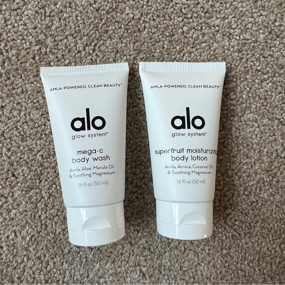Alo glow system travel size 16 oz sealed mega-c body wash and body lotion.